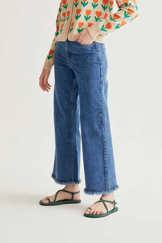 Blue Jeans With Raw-Cut Bottom