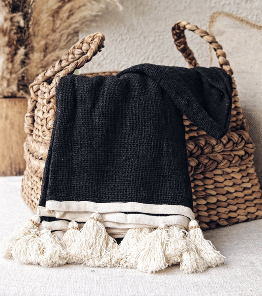 BLACK RAW COTTON THROW WITH NATURAL TASSELS